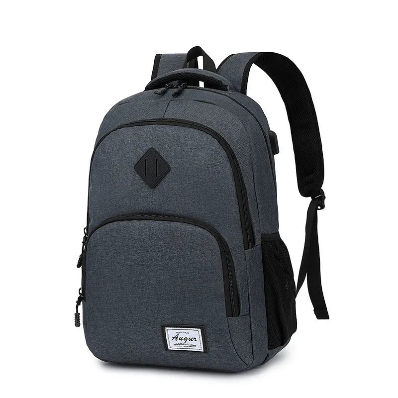Grey nylon backpack with USB charging port and trolley case strap showing 32x15x46cm dimensions