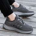 Men's and women's elastic band mom shoes with mesh upper in multiple colours and sizes.
