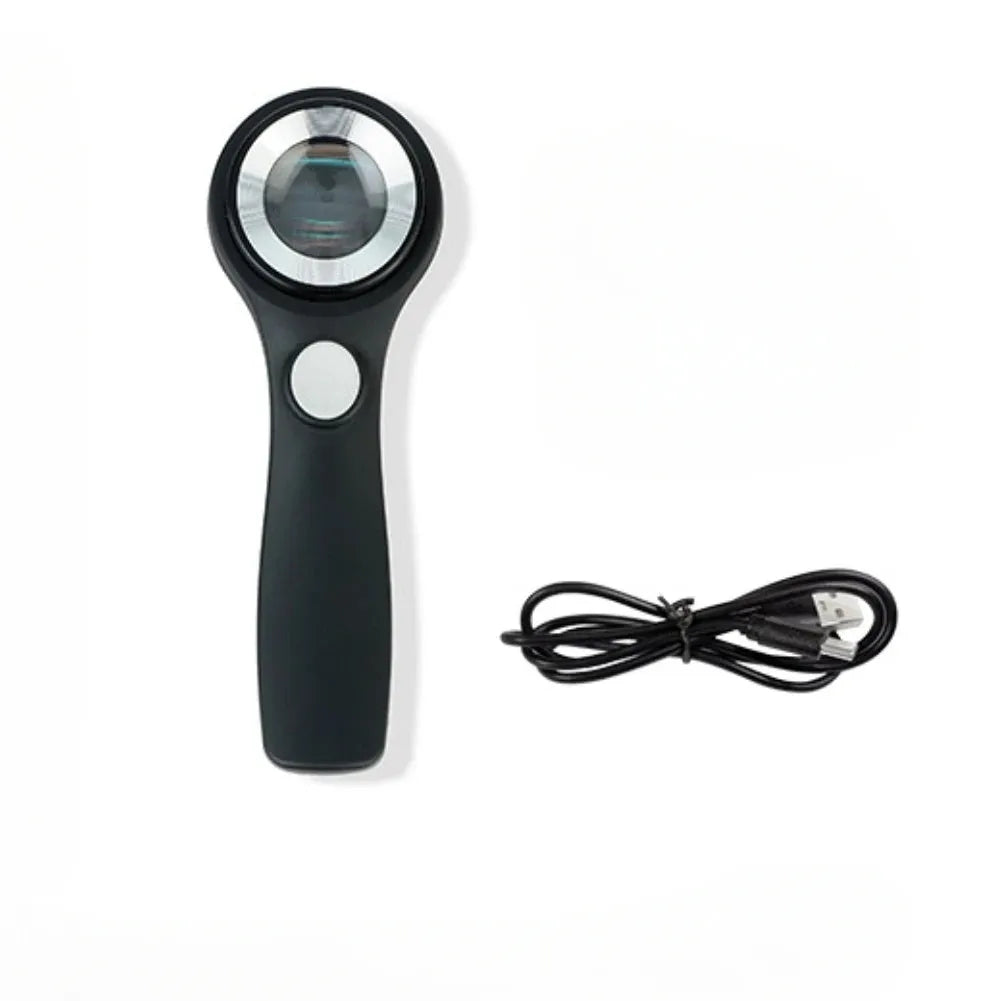 Black and silver metal jewellery appraisal magnifying glass with optical glass lens and USB-C cable.