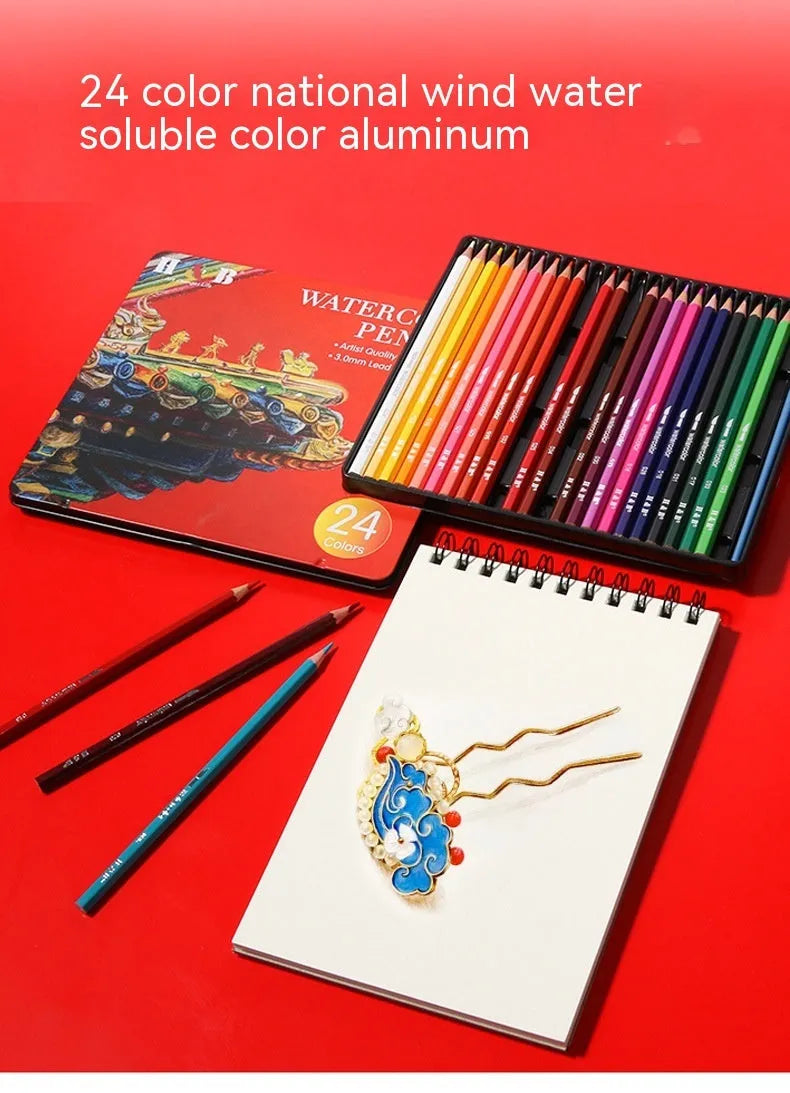 Water-soluble coloured pencil set with 24 colours, a brush, and a metal box open to show contents.