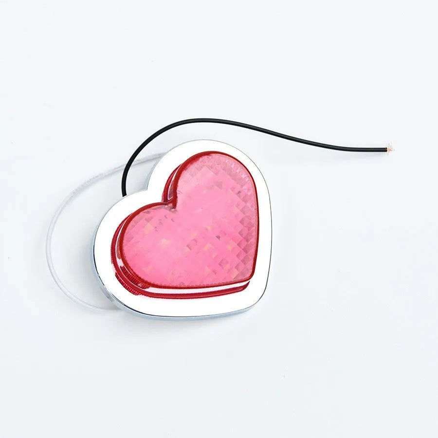 Heart-shaped 12V automotive LED sidelight unit in a choice of colours for vehicle fender modification.
