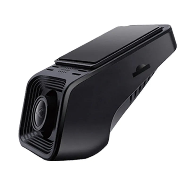 Black car dash cam mounted on windscreen with forward-facing lens and power cable