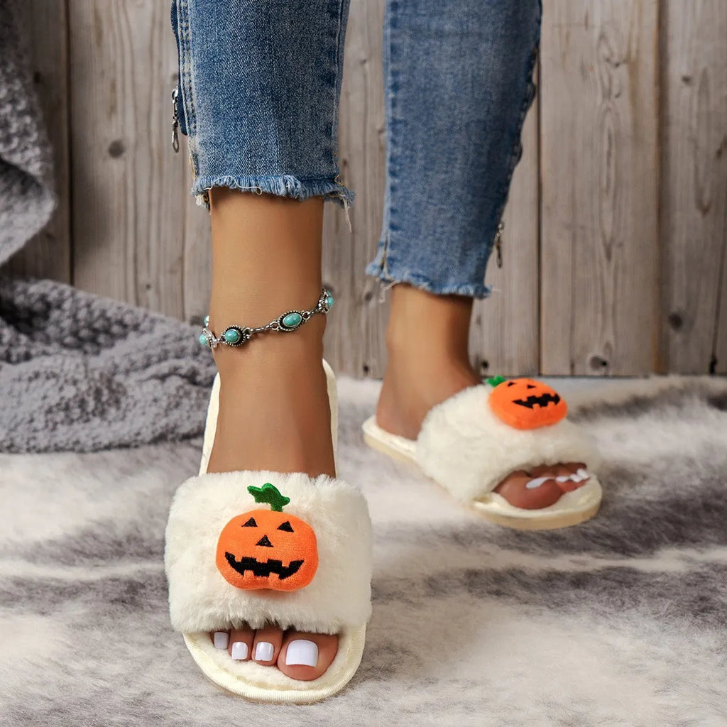 Yellow pumpkin cartoon plush slippers with synthetic fur upper and PVC sole, open toe design.