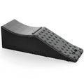 Black fabric car pad with a removable headrest cushion on a car seat.
