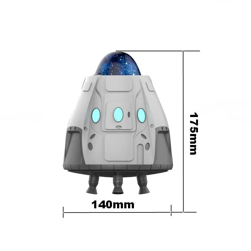 White space capsule Bluetooth ambience light projecting green northern lights on a dark wall.