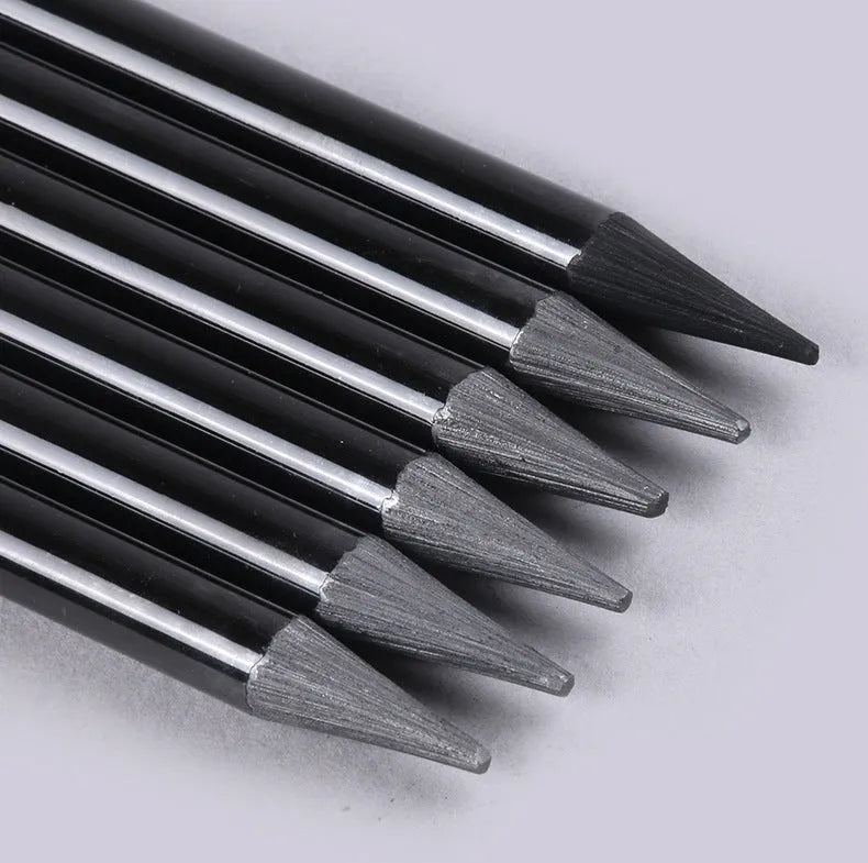 Carbonized Pencil Suit showing six graphite pencils and three carbonized pencils on wooden casing with suction card packaging