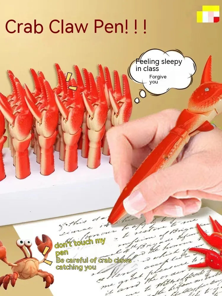 Crab-shaped novelty ballpoint pen with red pressable pincer clips on a white background