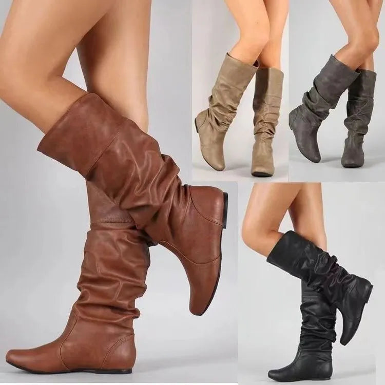 Women's black flat-heel slip-on long boots with a round toe and high cylinder shaft.