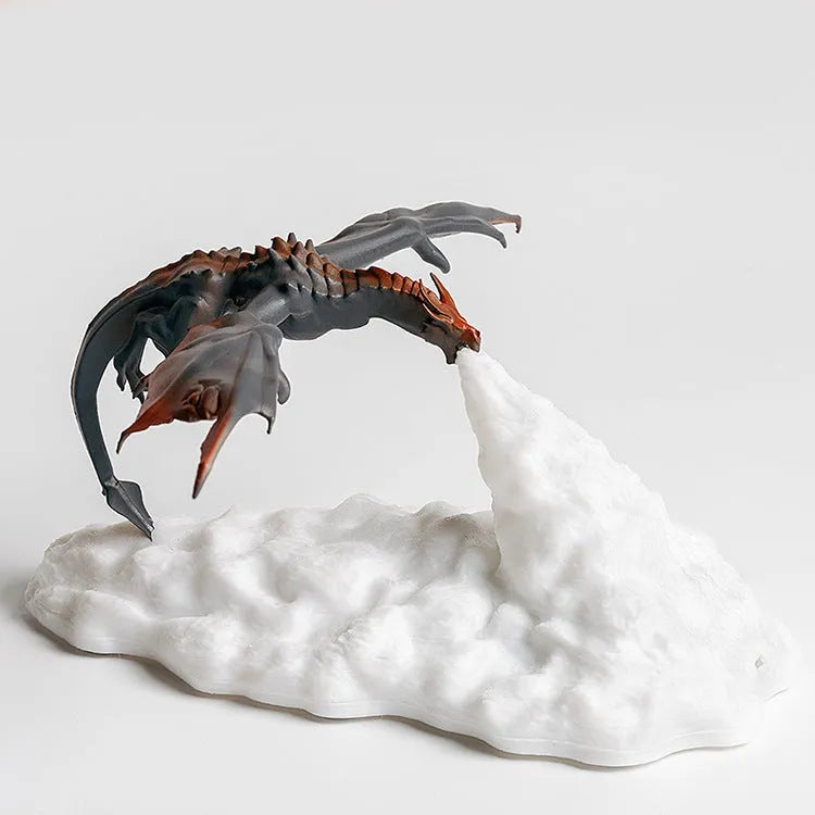 3D printed dragon lamp glowing with warm red light, showing detailed fire dragon design on a table.