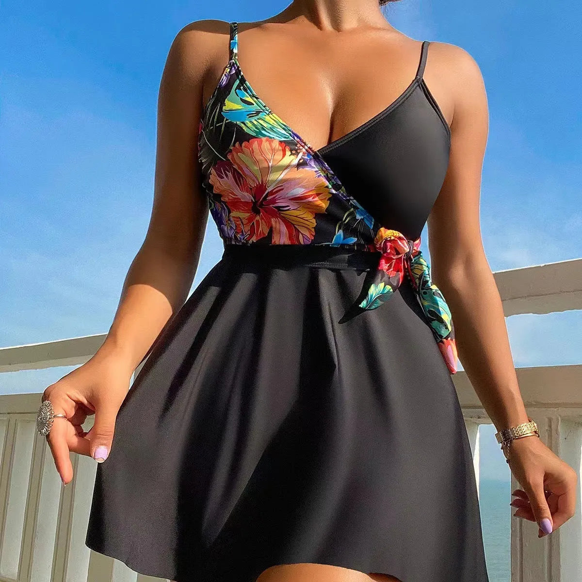Black women's high waist printed bikini briefs on a plain background.