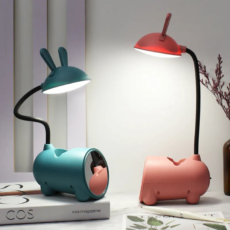 Cartoon style USB-powered desk lamp with pen storage compartment in dark blue colour