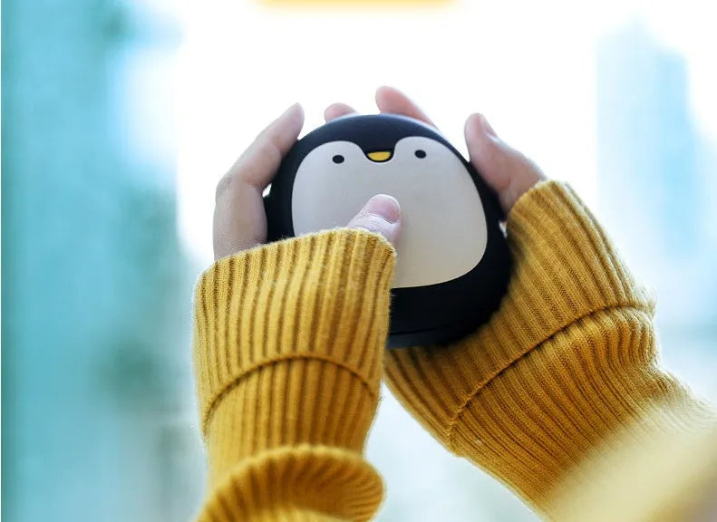 Cartoon penguin polar bear design USB rechargeable electric hand warmer showing front view