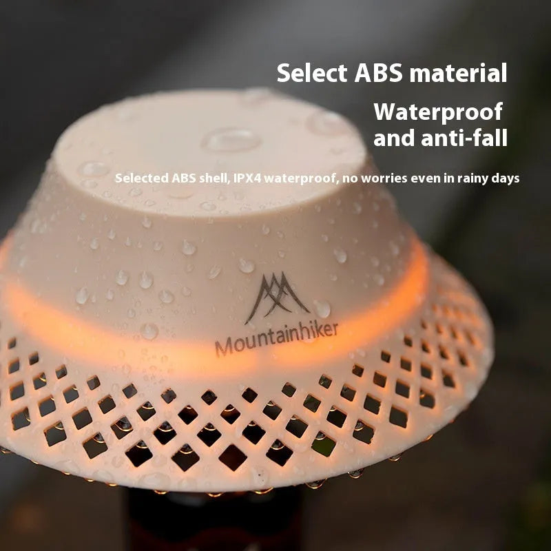 Beige wine bottle-shaped camping lantern with USB-C charging port and LED light