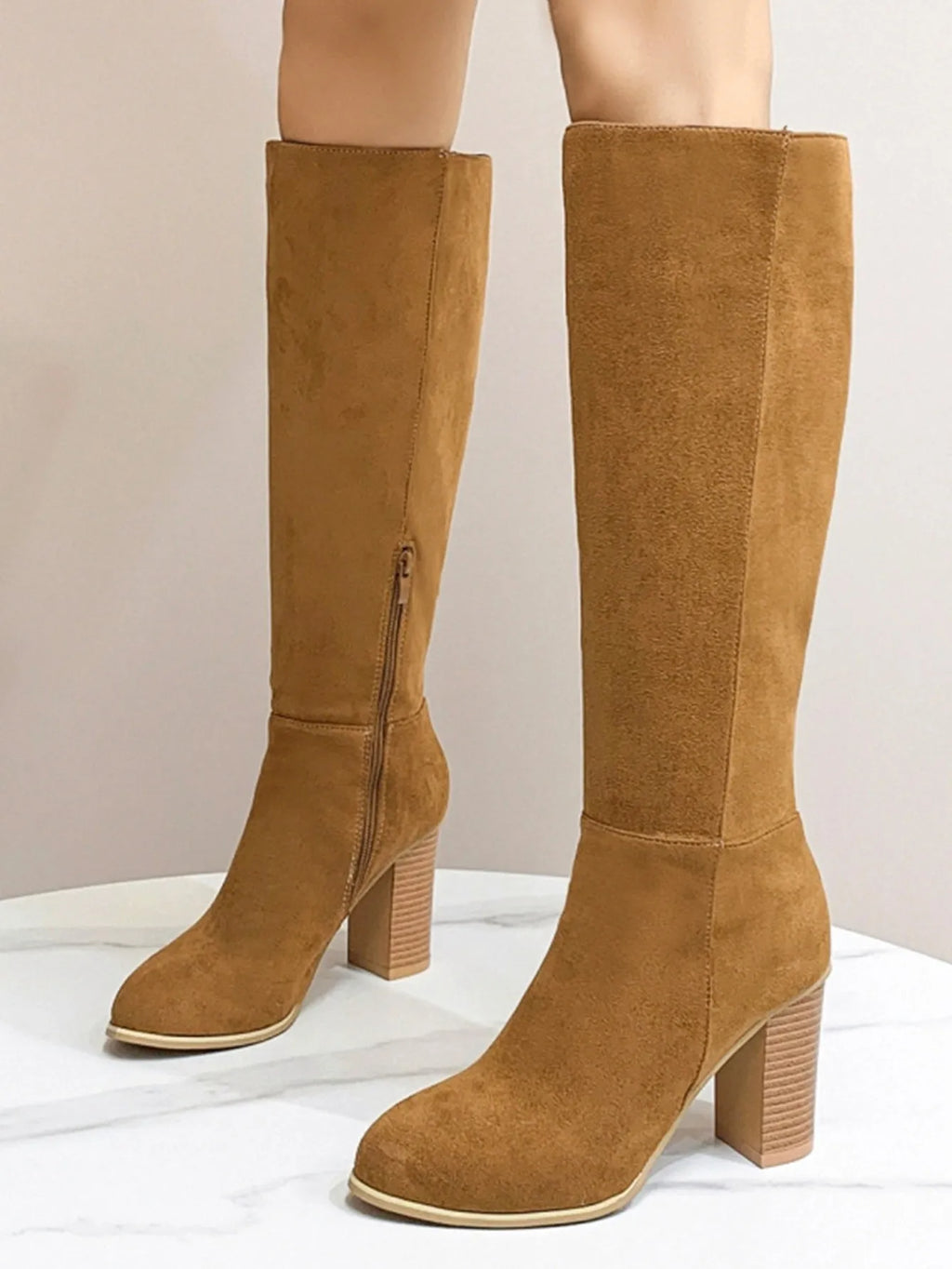 Women's black square toe high heel casual boot made of artificial PU.