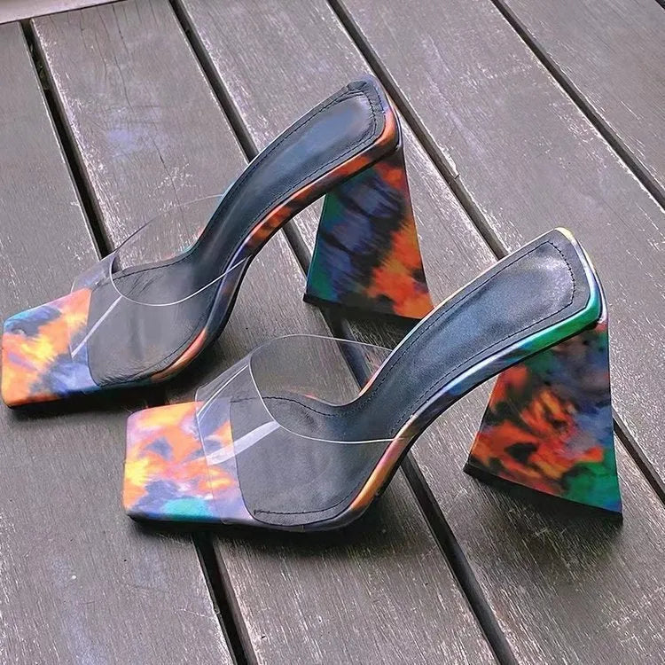 Women's black square toe high heel slippers with a thick triangle heel on a rubber sole.