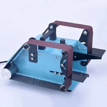 Blue desktop dual-axis belt sander with a 750W motor and variable speed control for sharpening and sanding.