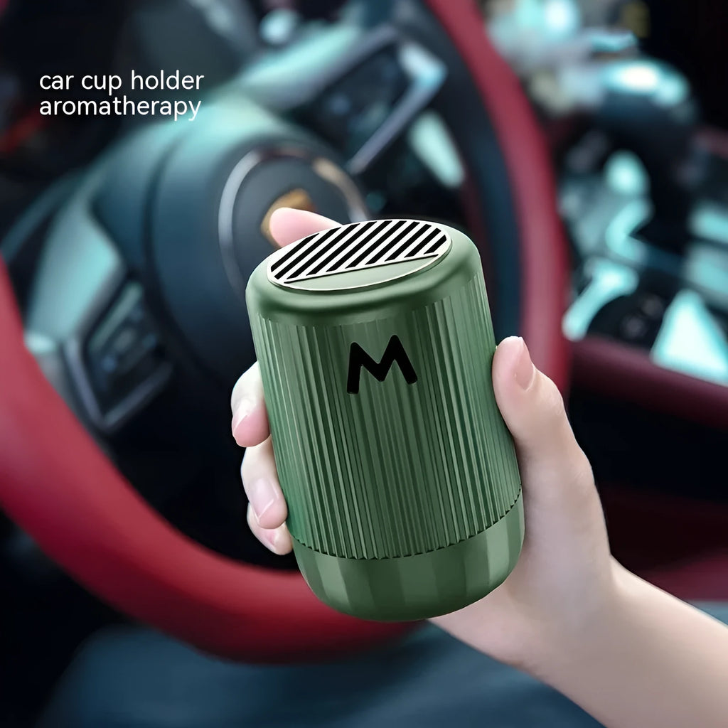 Solid car aromatherapy decoration cup measuring 10x6cm with four fragrance options