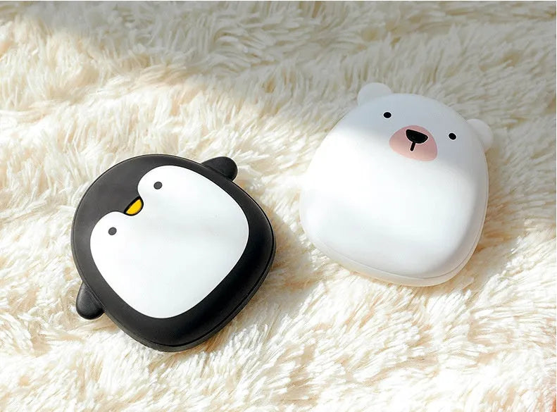 Cartoon penguin polar bear design USB rechargeable electric hand warmer showing front view