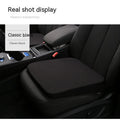 Black car seat cushion with memory foam filling measuring 42x39x6cm