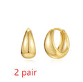 Brass diamond geometric earclip earrings with round elements and golden electroplated finish