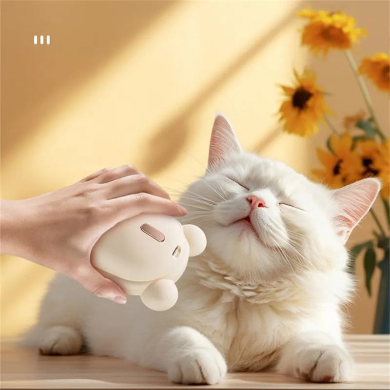 Pink and yellow rechargeable 3-in-1 pet grooming brush with spray function and massage comb teeth