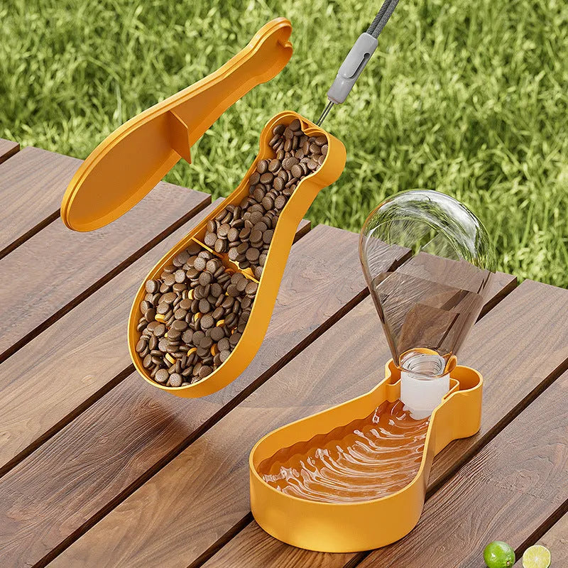 Orange and white portable pet water feeder with water bottle and food container compartments