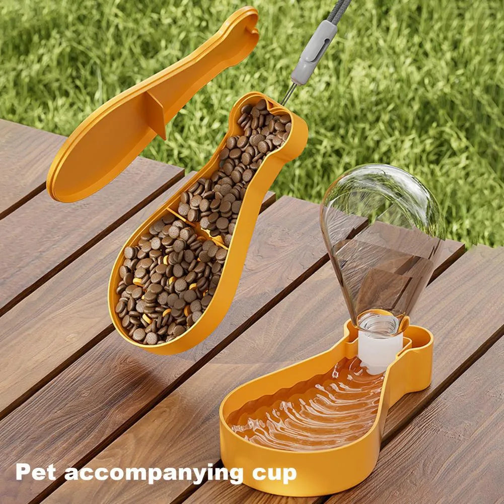 Orange and white portable pet water feeder with water bottle and food container compartments