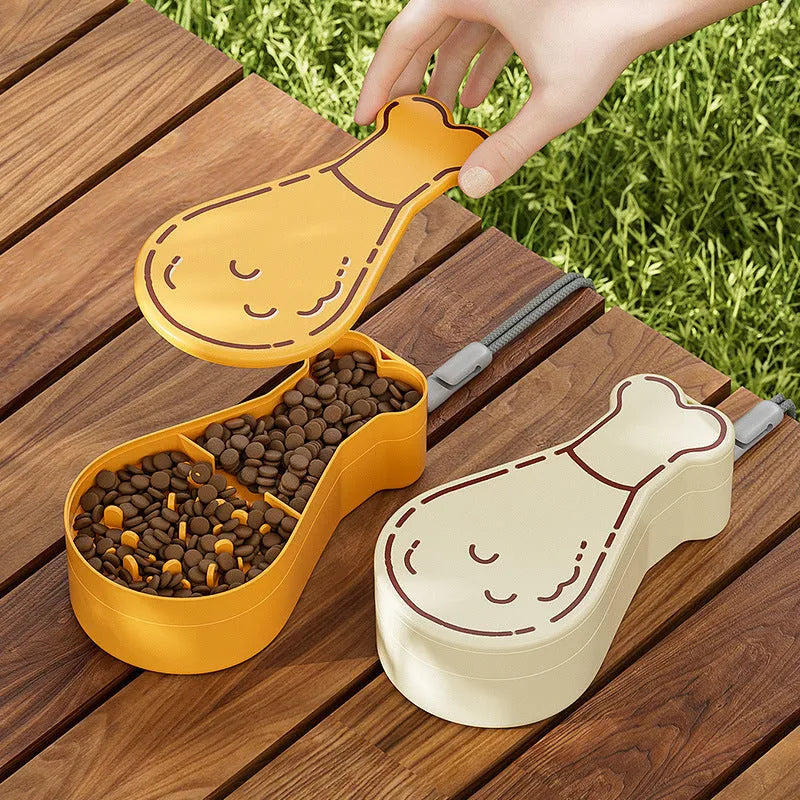 Orange and white portable pet water feeder with water bottle and food container compartments