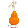 Natural rubber stuffable dog toy with a long strap for small to medium breed dogs.