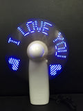 White handheld mini fan with LED love pattern lights flashing in blue and red colours