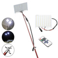 White LED fishing rod light panel mounted on a tall telescopic pole for outdoor use