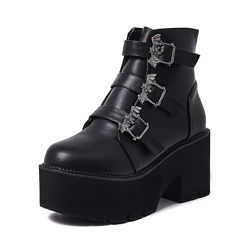 Black women's punk bat buckle gothic short boots with side zip and thick heel.