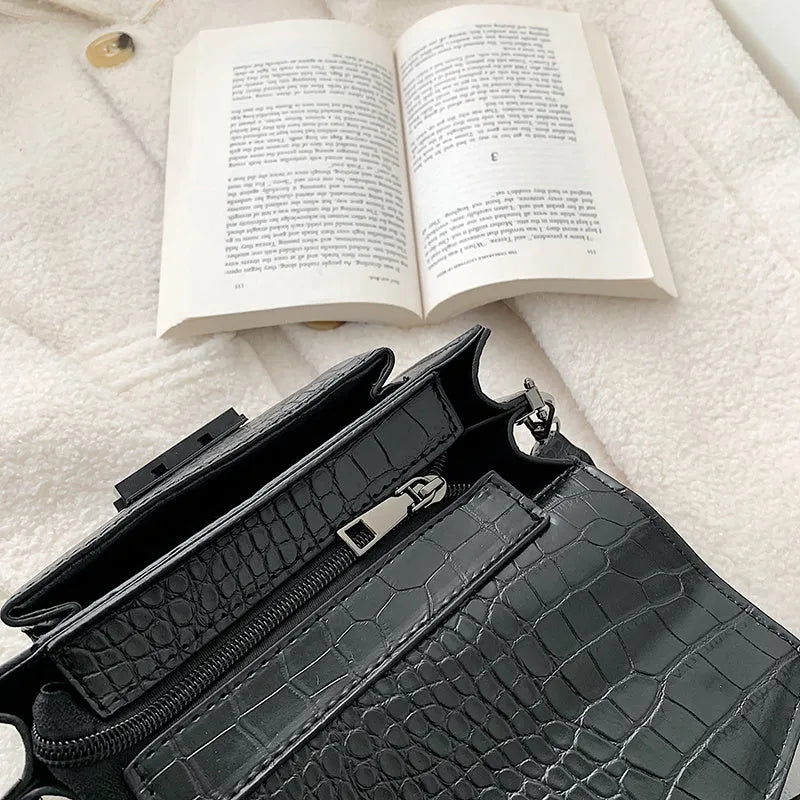 Vintage style crossbody bag in PU material showing 20cm width with four colour options