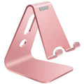 Aluminium alloy universal phone and tablet mount in silver colour on a wooden desk.