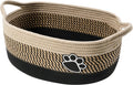 Handmade light beige woven cotton rope storage basket with a wooden handle