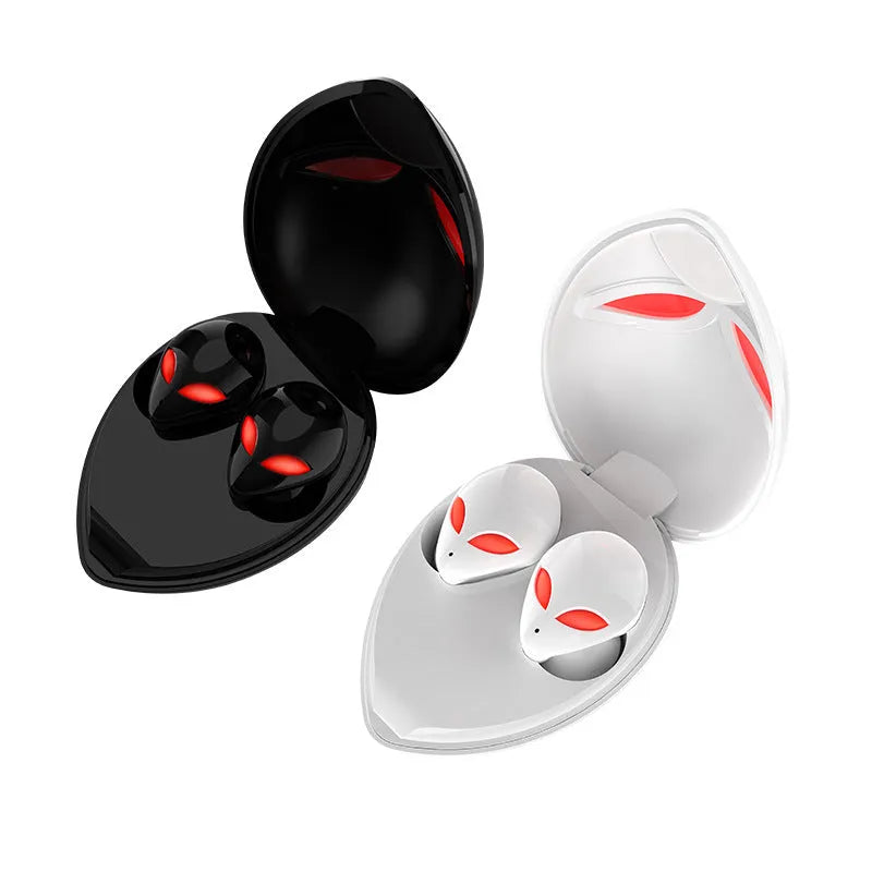 Creative Outer T8 Starman alien-design Bluetooth earbuds with red LED lights and wireless charging case.
