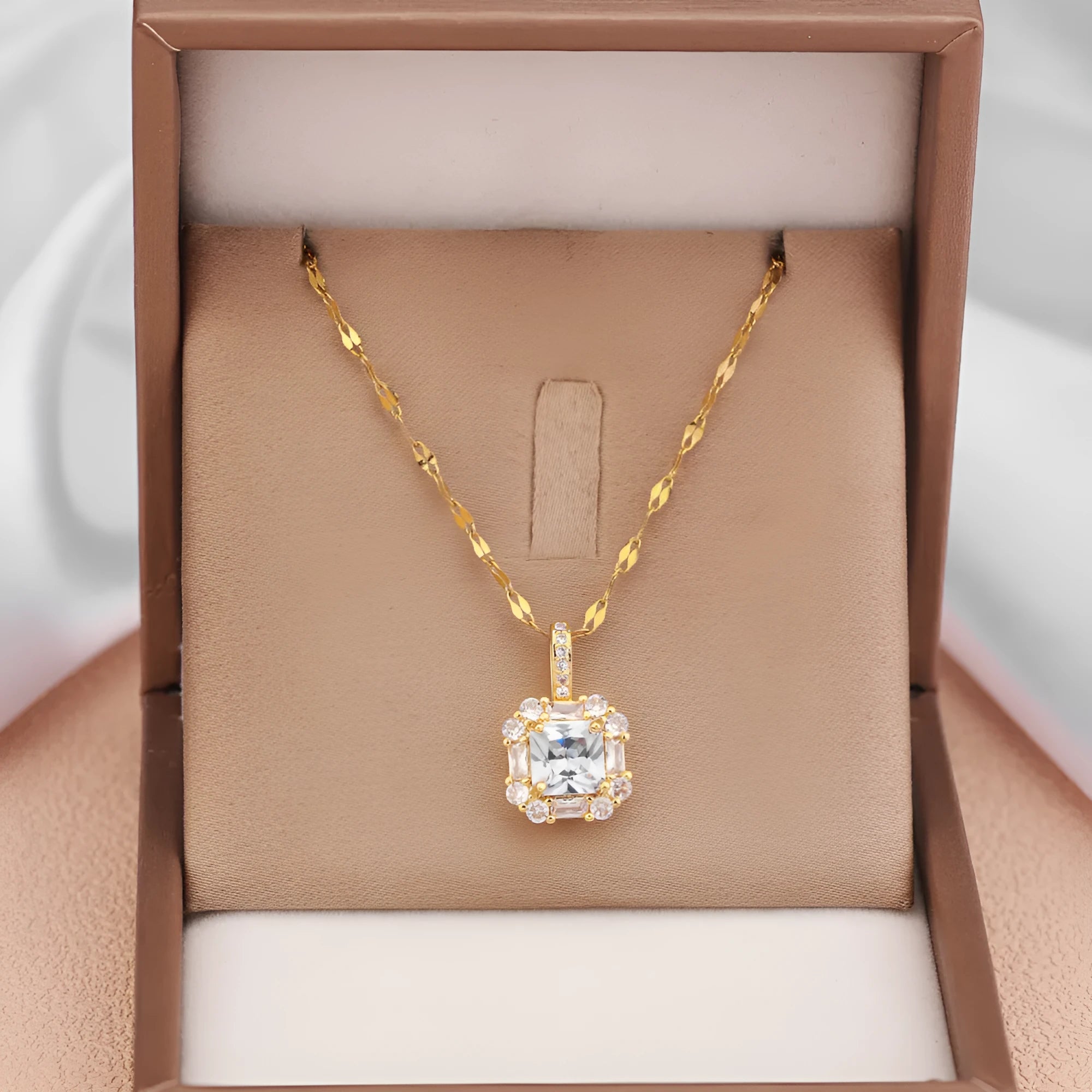 Women's titanium steel clavicle chain with geometric zircon and gem inlaid pendant in gold