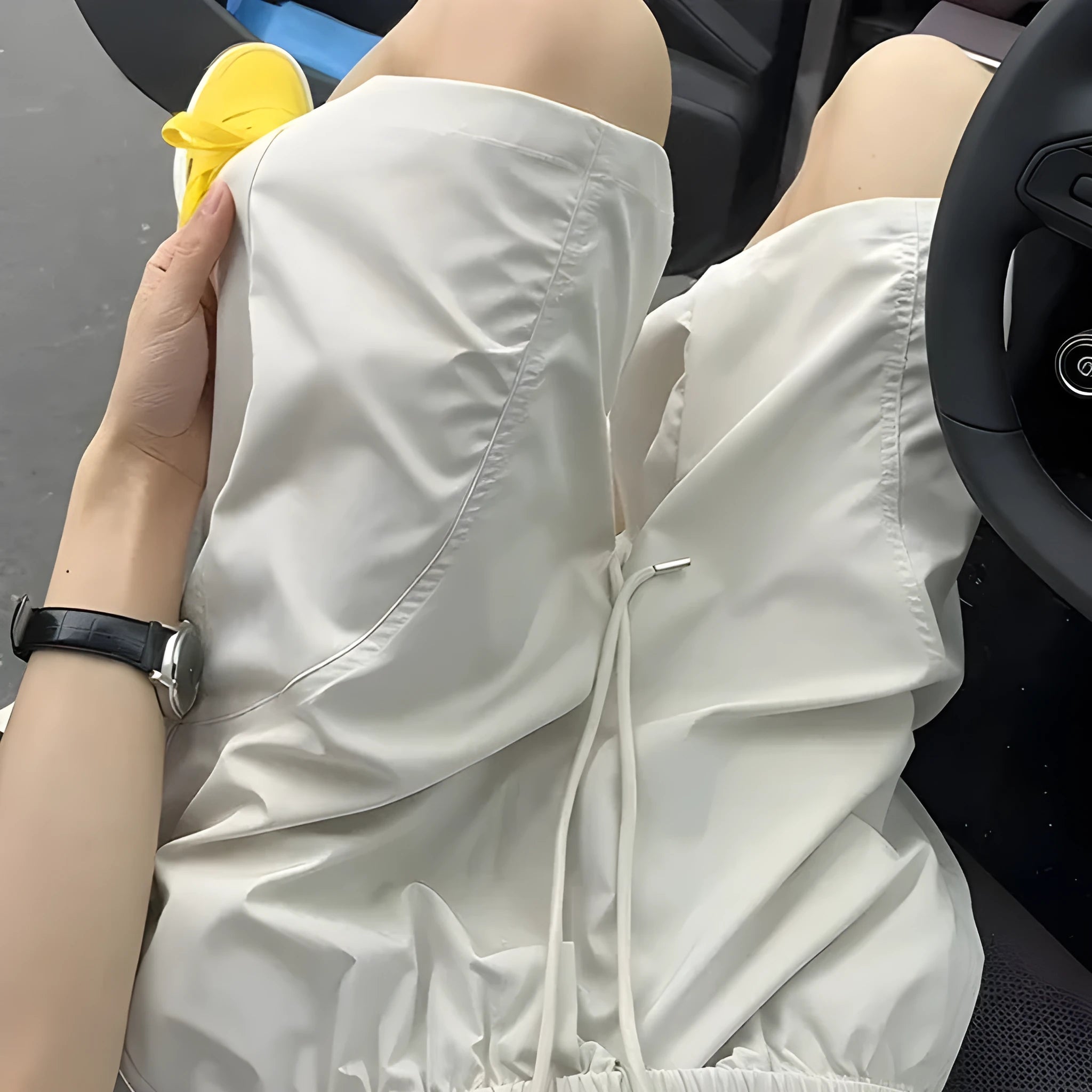 Men's beige quick-drying polyester slant sports shorts with elasticated waistband.