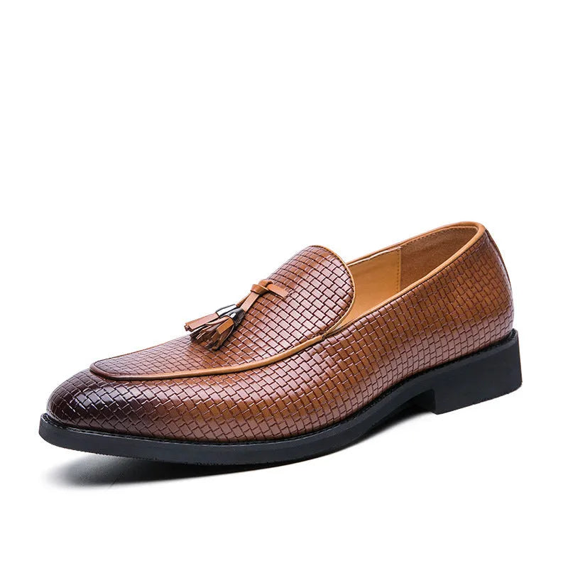 Men's black slip-on shoes with pointed toe and tassel decoration on artificial PU upper