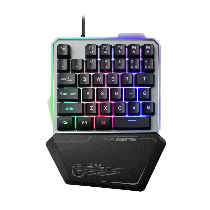 G40 black one-handed mechanical keyboard with RGB backlit keys on a desk.