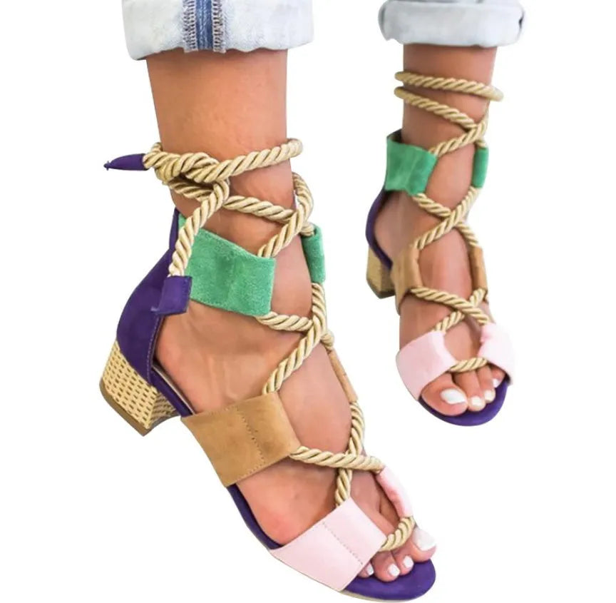 Women's beige suede sandals with thick matching heels and front strap design