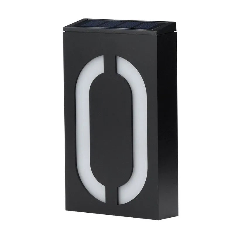 Solar powered house number light with LED illumination showing digit example on wall mounting
