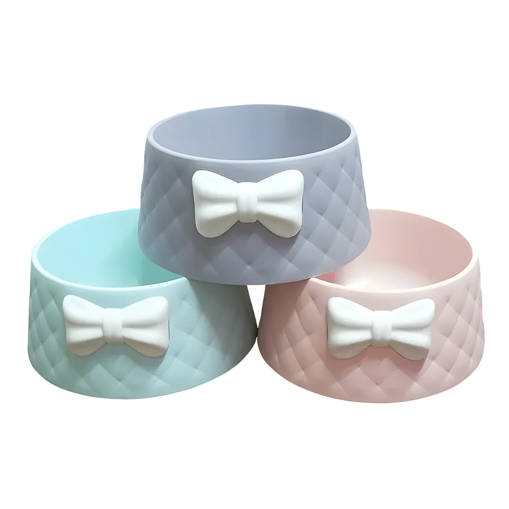 Bow design cat and dog bowl in PP plastic available in pink green and grey colours