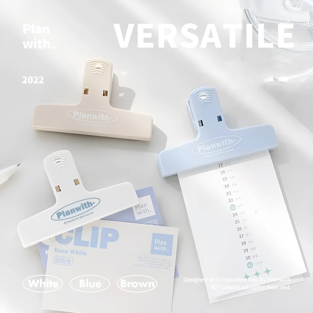 Blue Haze Series magnetic ledger clip holding papers, showing size and magnetic closure
