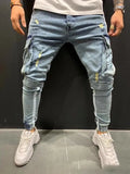 Men's denim knee-cut zipper trousers in black, front view, showing zipper placket and relaxed fit