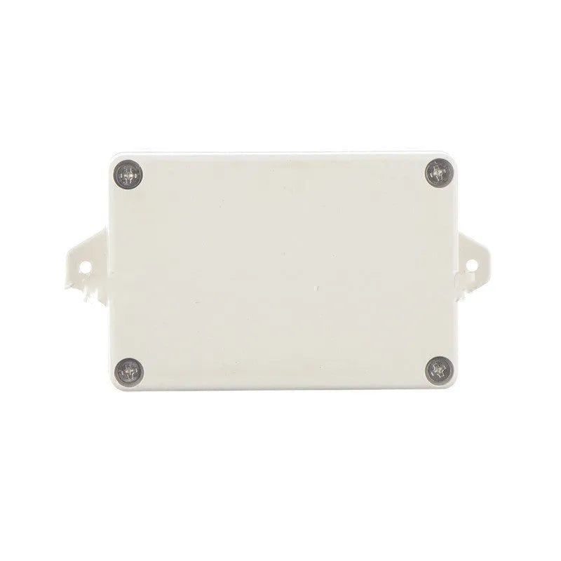 F4B-1 black ABS plastic waterproof junction box for electronic components, 100mm long.