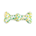 Large camouflage patterned natural rubber bone chew toy for dogs on a plain background.