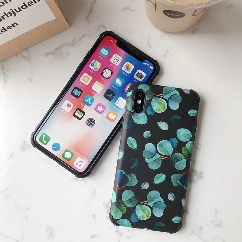 Black silicone leaf pattern phone case shown fitted on an iPhone.
