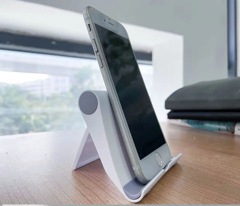 PE folding mobile phone and tablet desktop stand in black on a white background