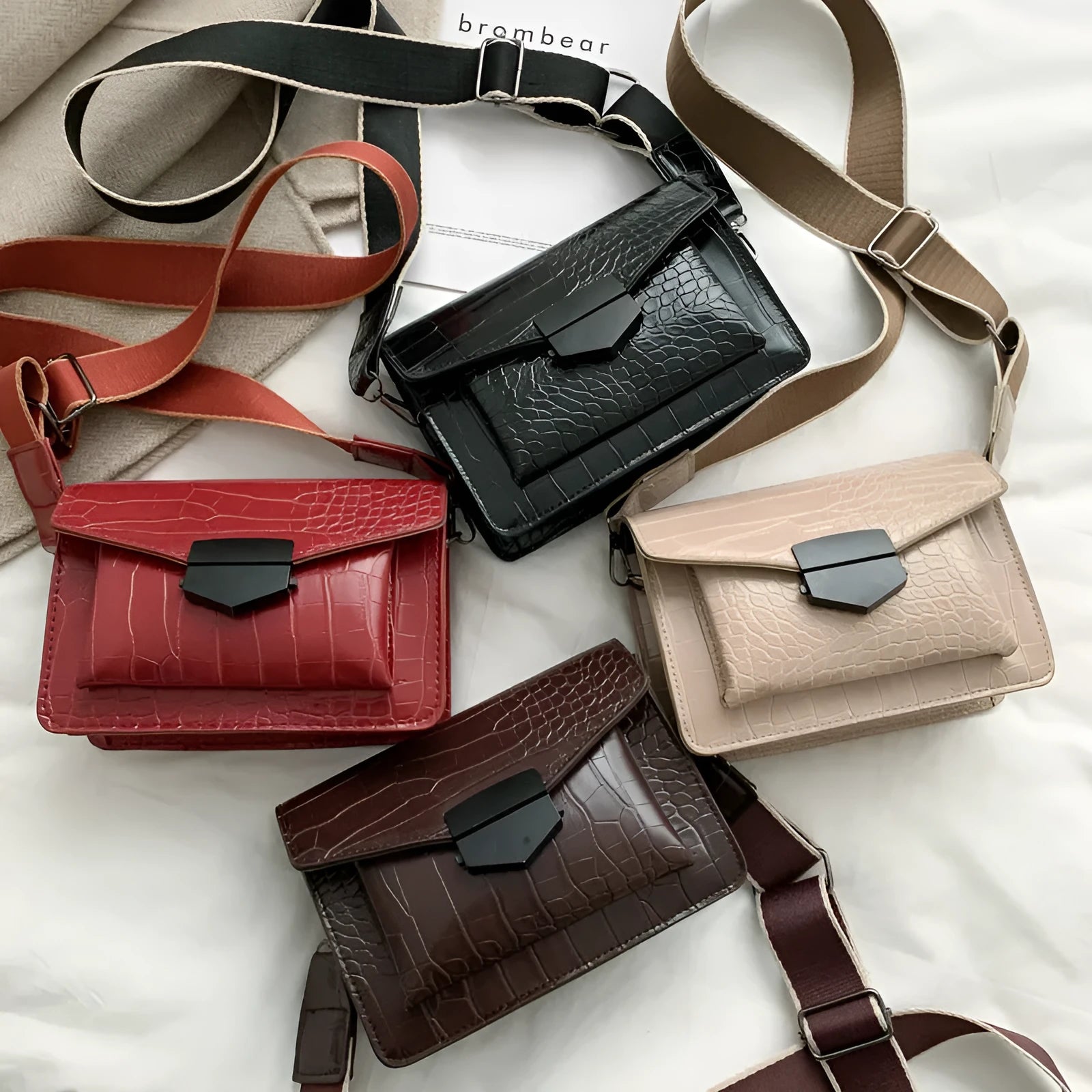 Vintage style crossbody bag in PU material showing 20cm width with four colour options